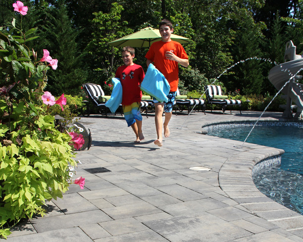 Boys Running Poolside