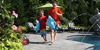 Boys Running Poolside